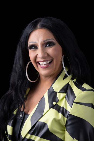 Headshot of Kim, sparkle-loving concierge and social media queen at Charizma Entertainment in Chicago