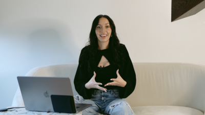 woman sitting in a chair and teaching class