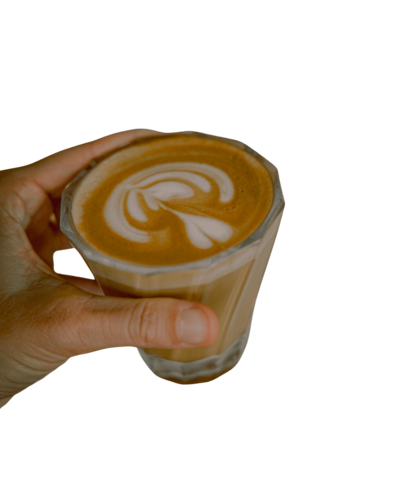 hand holding artisanal coffee drink from trilogy kauai