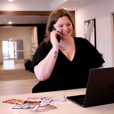image of a woman on the phone smiling