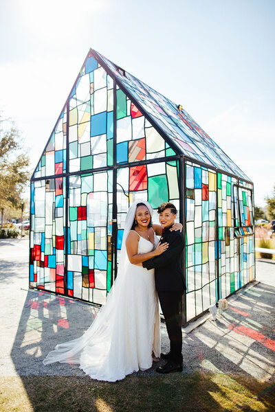 Two Brides posing for a portrait at their Orlando Florida Wedding