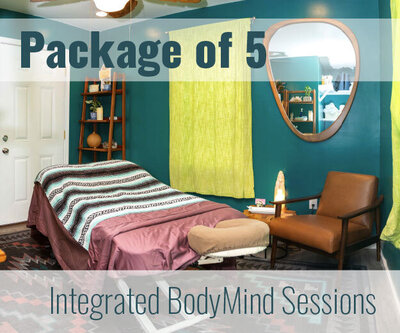 Female on floor getting leg work Thai massage