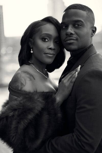 a man and woman kissing in providence rhode island for their engagement photography session