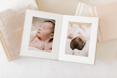 A photo album with images of a baby inside by Katie Stansfield Photography, a family photographer in Richmond.