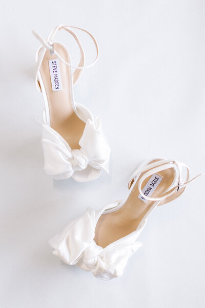 Bride's wedding shoes in a flat lay detail shot