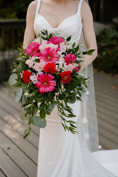 Close-up of a bride holding her wedding bouquet during a New York City wedding, photographed by NYC wedding and elopement photographer Dom Augustine.