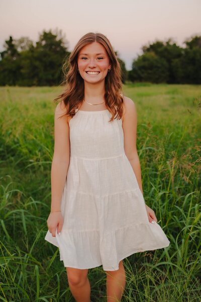 sydney chapman posing in field