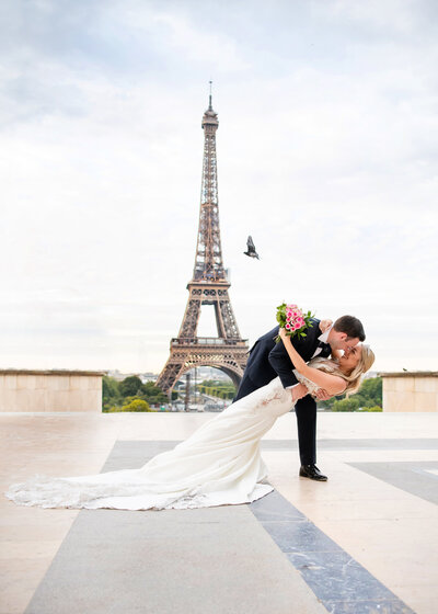 Bride under her veil wearing a flower crown.