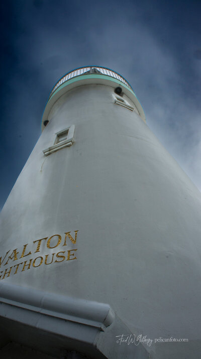 Towering Santa Cruz Harbor’s Walton Lighthouse braces for oncoming winter storm.