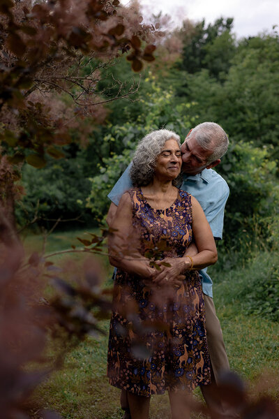 Heartwarming anniversary session of mature couple in the gardens of Summit Metro Parks, Akron, Ohio