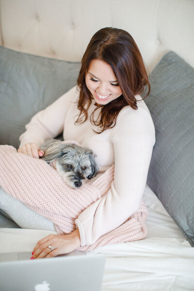 Woman holding a dog