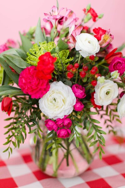 red, pink, and white floral bouquet