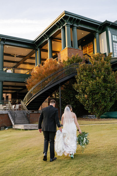 Bride and groom holding hands, Wilmington NC wedding photography by D McHugh