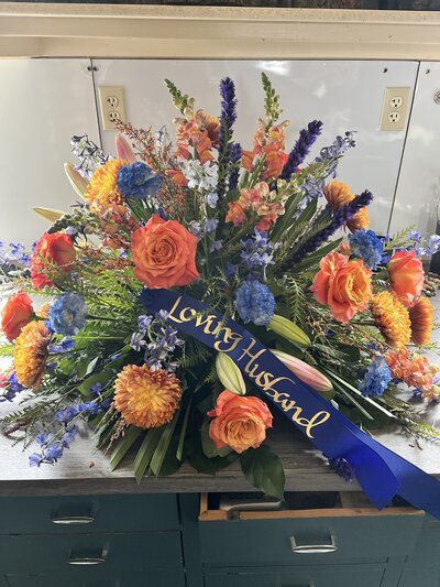 head table flower arrangement for wedding party at Herms in Logan Utah