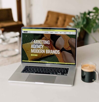 Mockup of a website template on a laptop.