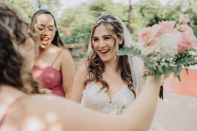 bride and bridesmaids dancing florida wedding