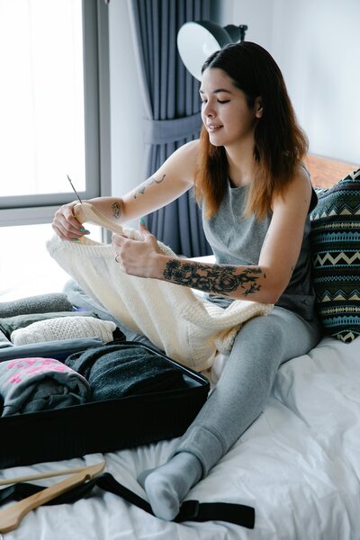 Woman Unpacking Project Basecamp Sober Living