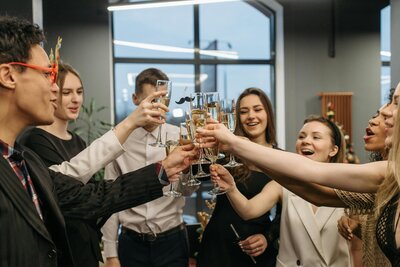 Guests raising glasses at a corporate event in Colorado