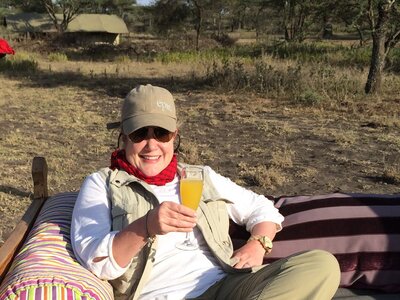 Stephanie relaxing with a cocktail while on vacation