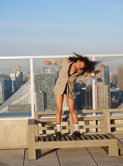 woman having fun on a roof in nyc