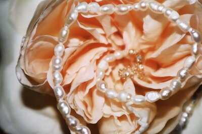 Image of a flower with jewelry from Luxury Photographer at ADP Studio