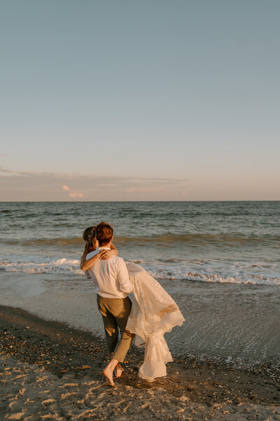 beach elopement at sunset