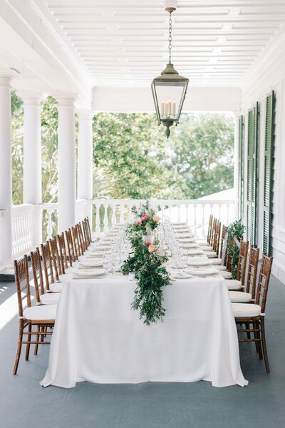 long reception table with floral runner