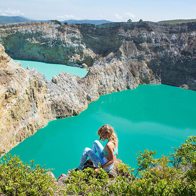 Solo female traveler exploring the crater lakes of Flores, Indonesia