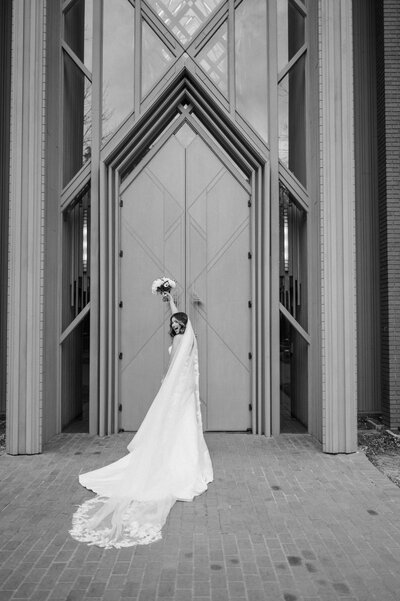 Bride and groom walking up on stage for ceremony at hillside estate