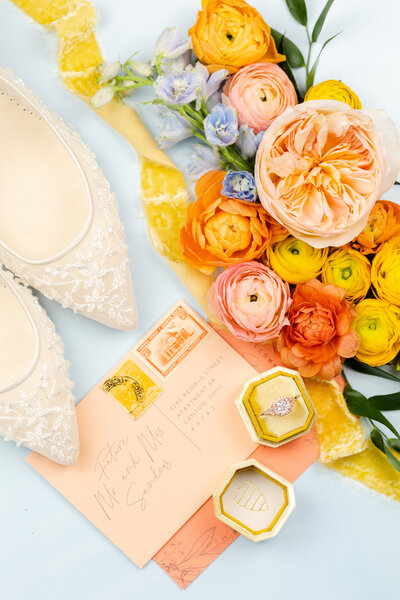wedding invitation with wedding shoes captured by cleveland ohio wedding photographer