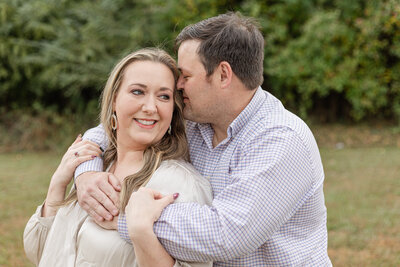 Husband smiling with wife