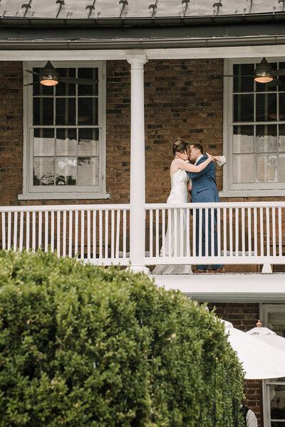 Birkby House porch with bride and groom