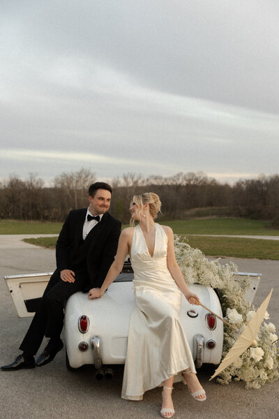 bride and groom vintage car