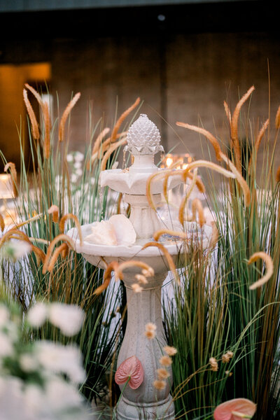 Wedding reception floral installation and fountain at Monroe Street Abbey in Phoenix, AZ by Snapdragon Bloom Bar.