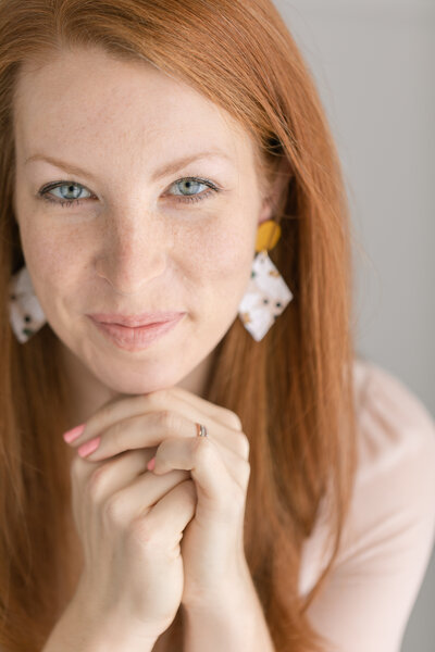 woman wearing clay earrings for jewelry brand photo shoot