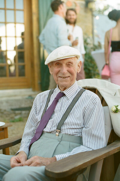 portrait of bride's grandfather at her wedding