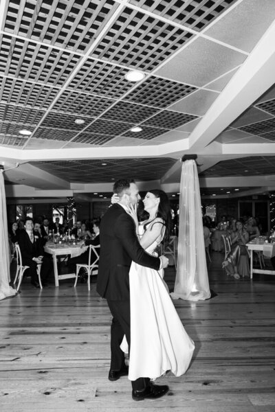Bride in groom's first dance