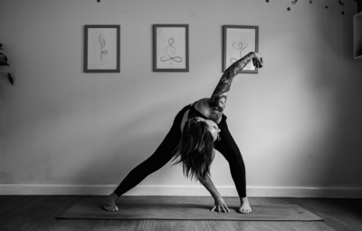 Image of Nat Winterson owner of Studio Eight in Wells in a yoga pose