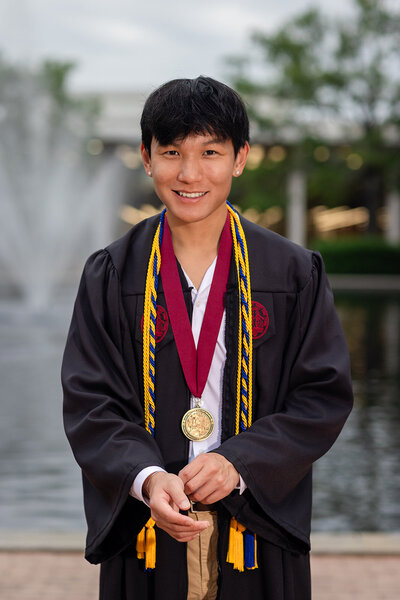 A guy taking his senior portrait in  Columbia, South Carolina