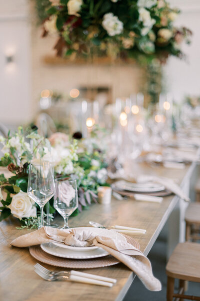 Blush chargers and knotted place setting of the Maxwell Raleigh inspirational shoot captured by Fabiana Skubic.