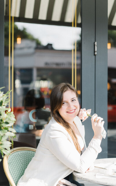 Maila Enea smelling a flower at a Luxury Wedding  | London & Sicily Wedding Portfolio of Maila Enea Events