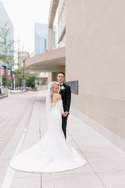 bride and groom in downtown dallas arts district by Kortney Boyett Photography, Dallas wedding photographer