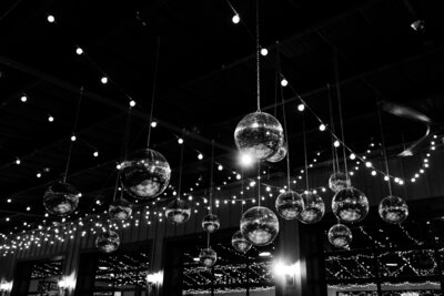 Disco balls hanging from the reception venue