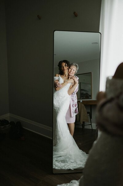 Bride with mom before Elopement ceremony in bridal suite