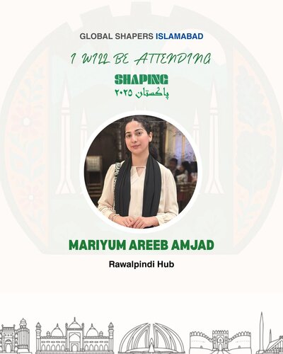 Mariyum has dark hair that is tied back. She is wearing a cream top and a black scarf along her shoulders