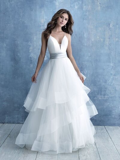 This A-line gown features a sweetheart neckline and beaded appliques throughout. Manager