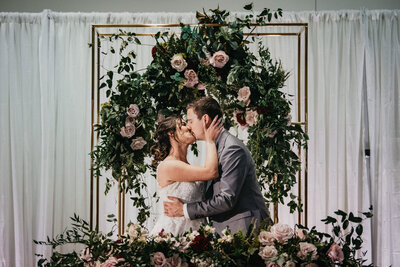 Bride and Groom dancing on monogram dancefloor in Fairmont Macdonald ballroom