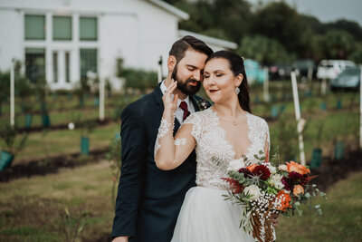 bride and groom at ever after farms