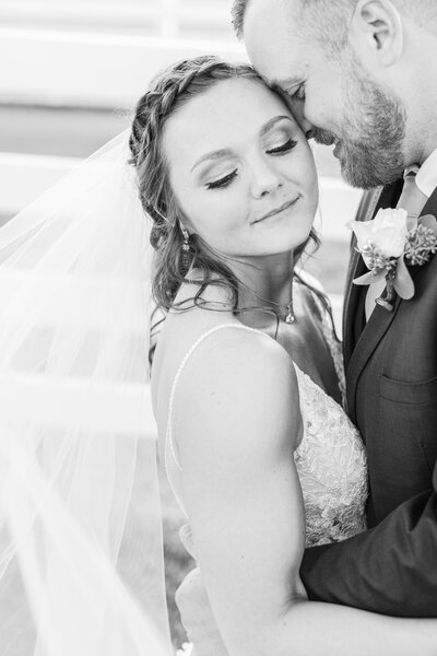 intimate photo of bride and groom embracing