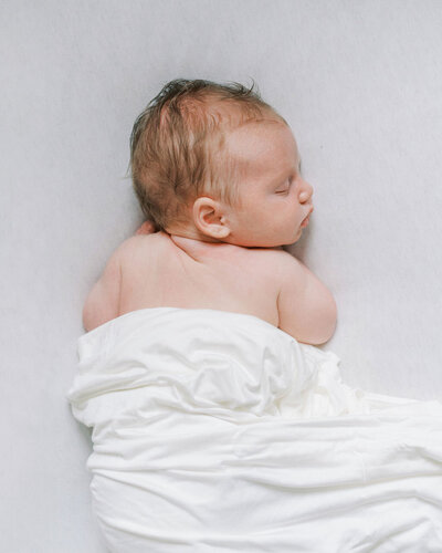 Richmond Newborn Photographer | Photo of a naturally-posed sleeping newborn baby boy by Jacqueline Aimee Portraits